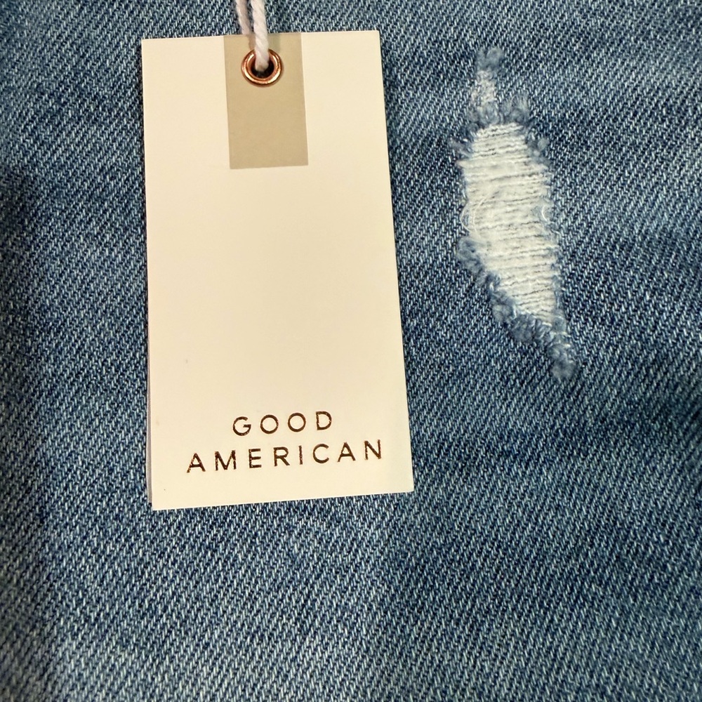 Good American Denim Bermuda Shorts in Medium Blue with Frayed Hem - Picture 3 of 7